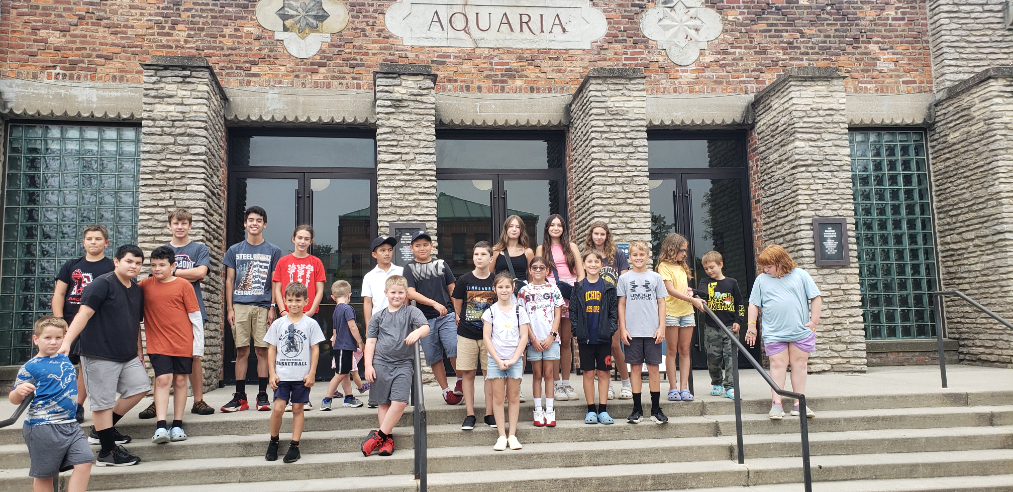 Photo of all of us in front of an aquarium